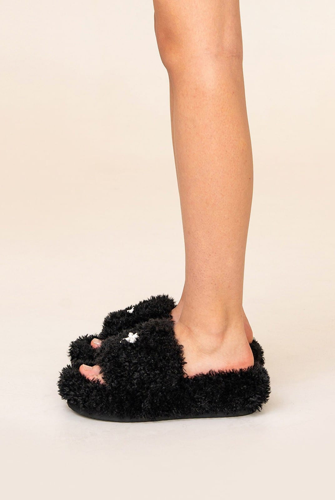 SMFK Cross Motif Faux Fur Platform Slides in Black - On Model