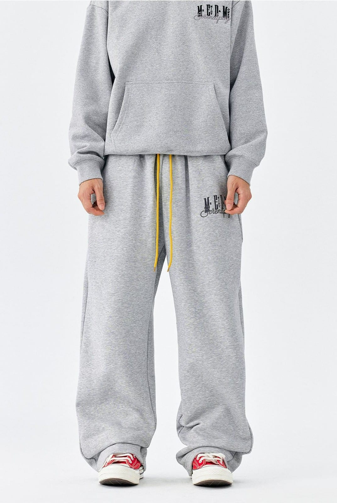 MEDM Fleece Lined Embroidered Sweatpants in Gray - On Model