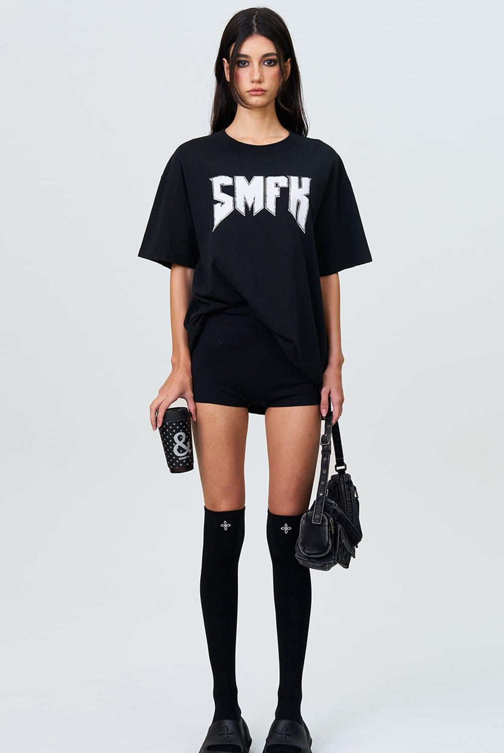 SMFK Metallic Logo Cotton T Shirt in Black - On Female Model