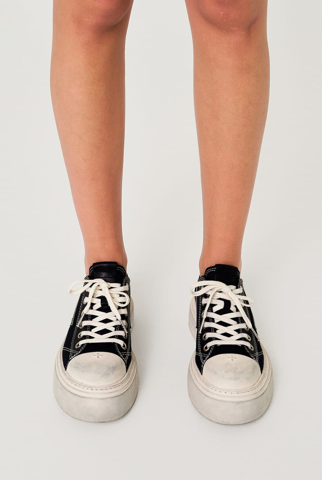 SMFK Distressed Canvas Skate Sneakers in Black - On Model