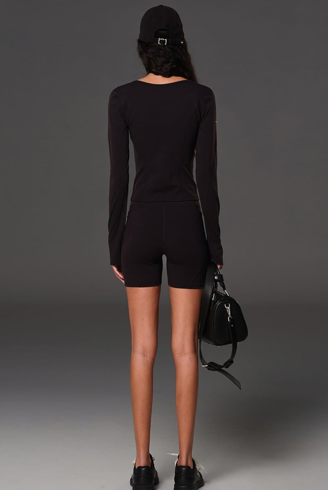 SMFK Scoop Neck Zip Up Sports Jacket in Black - On Female Model