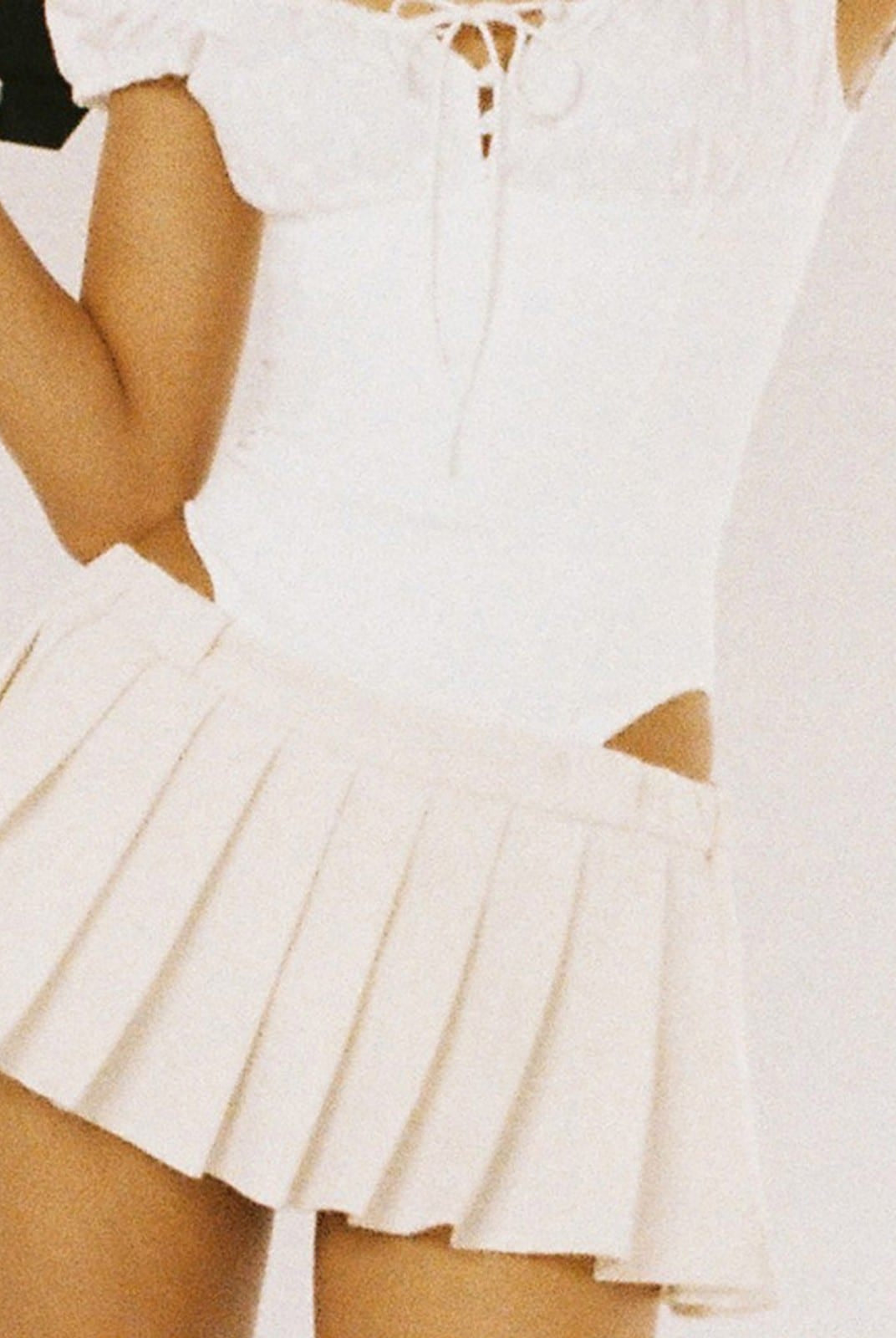 SweetChilling Sporty Paneled Cutout Pleated Mini Dress in White - On Female Model