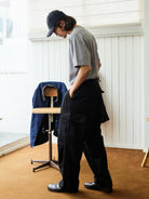 USAGE Heavyweight Ripstop M51 Cargo Pants in Black - On Male Model