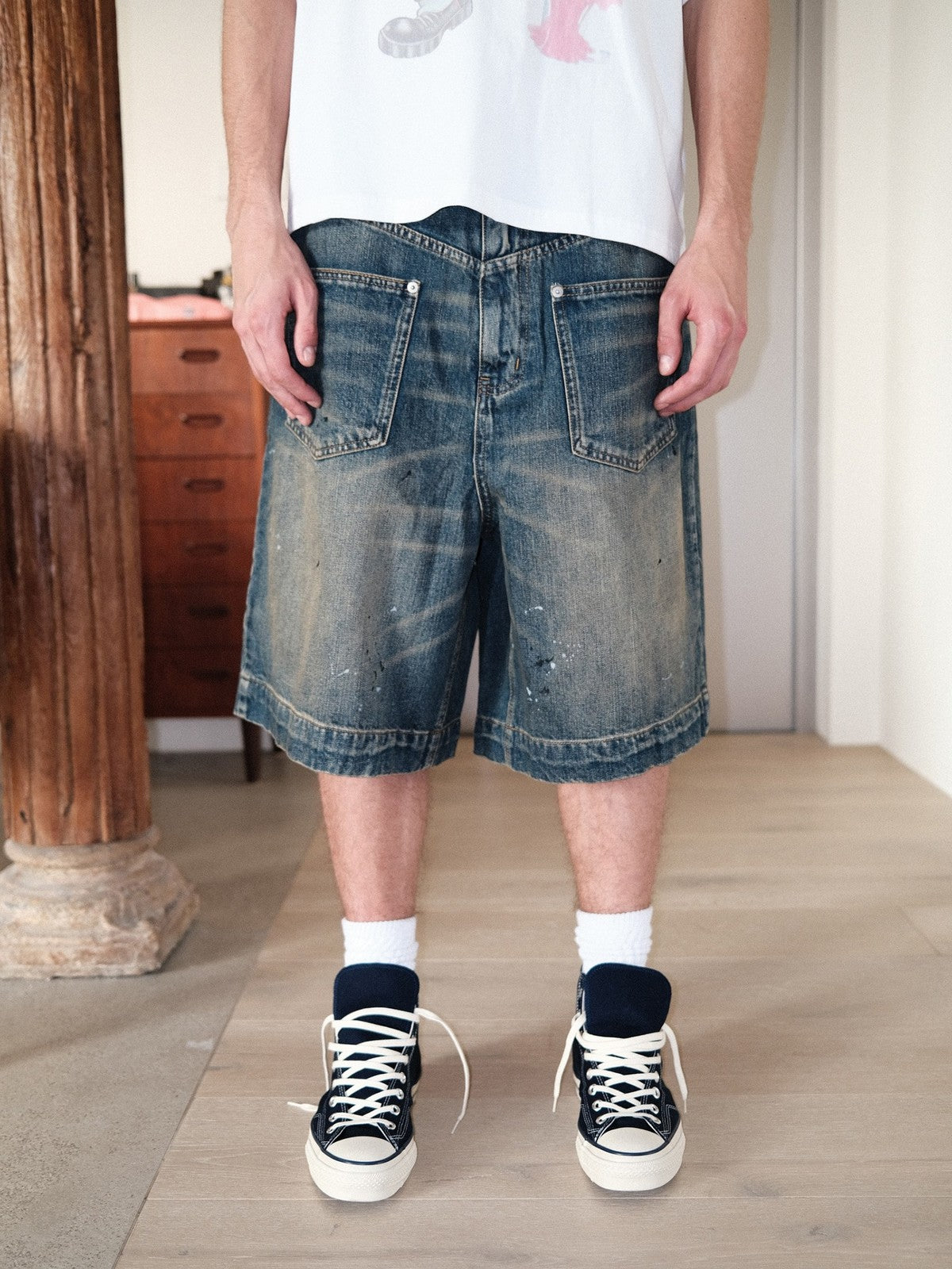 UNKNOWNWORLD Mud Dye Reverse Pocket Shorts in Yellow - On Male Model