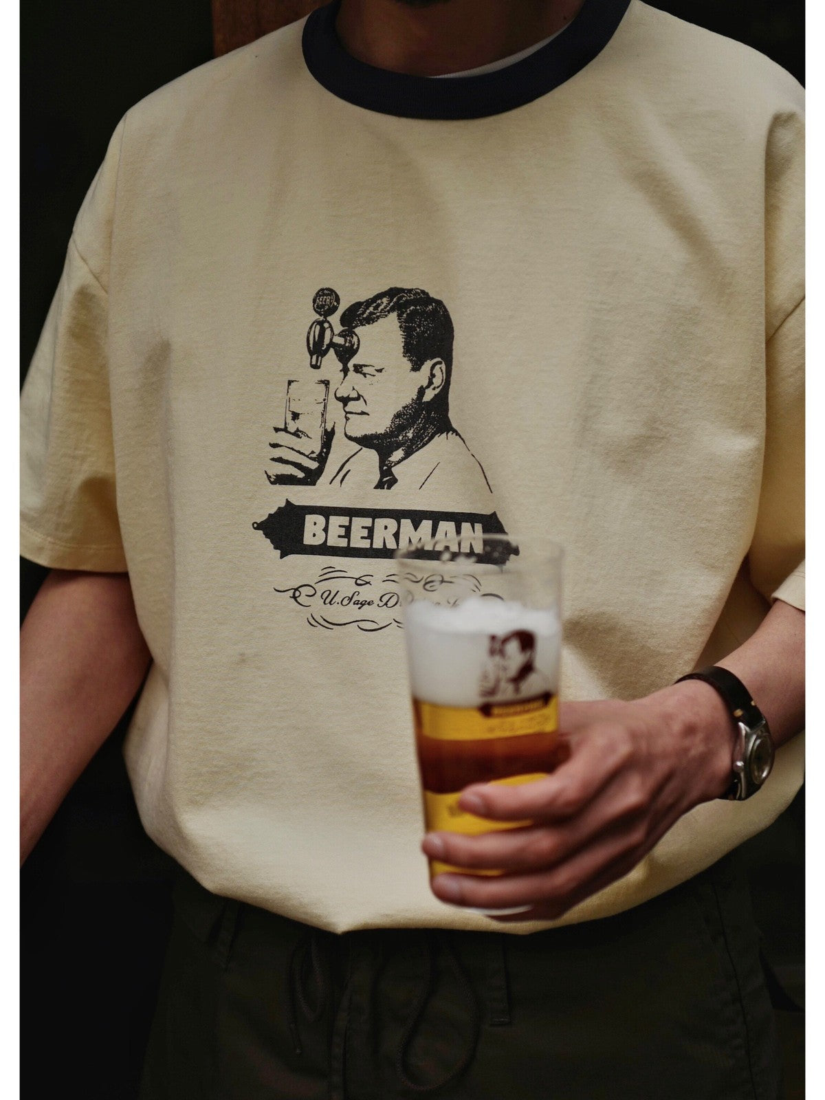 USAGE Graphic Cotton Ringer T Shirt in Cream - On Male Model