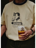 USAGE Graphic Cotton Ringer T Shirt in Cream - On Male Model