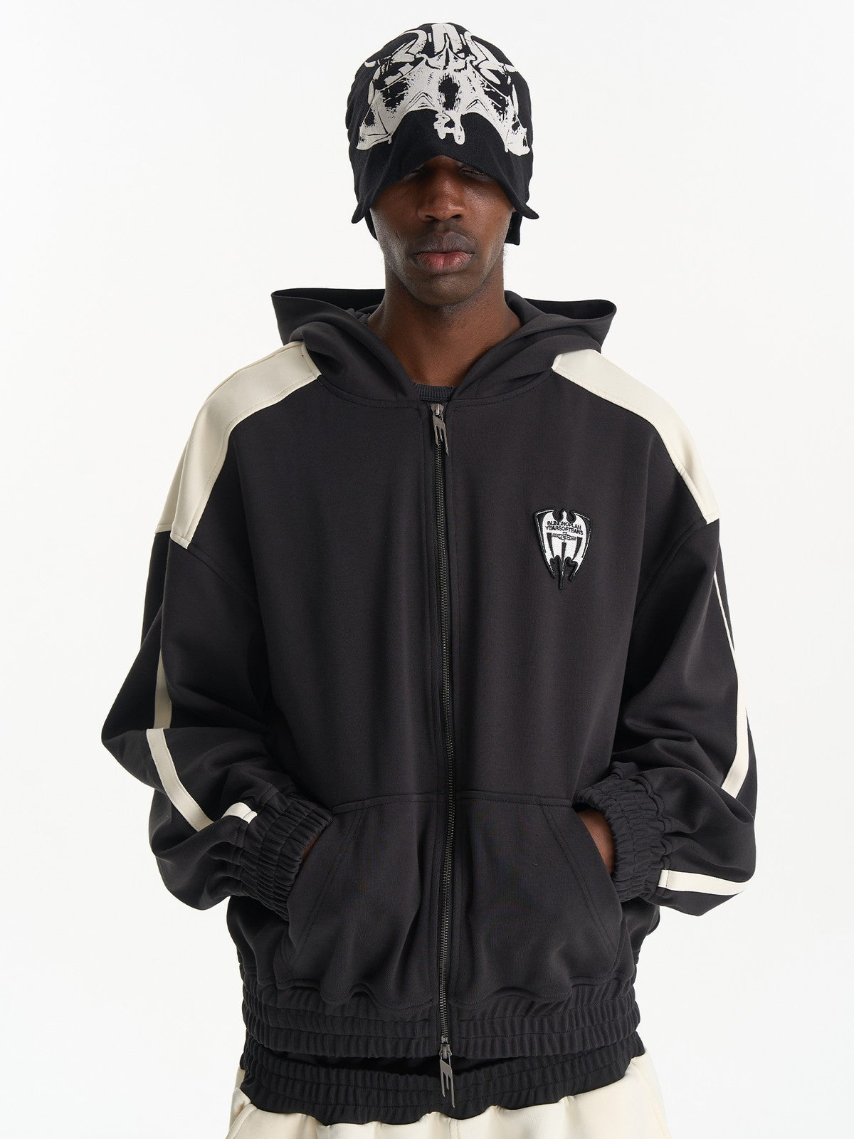 BLINDNOPLAN Hooded Colorblock Track Jacket in Black - On Male Model