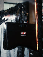 BLINDNOPLAN Textured Faux Leather Asymmetric Tote in Black - Lifestyle