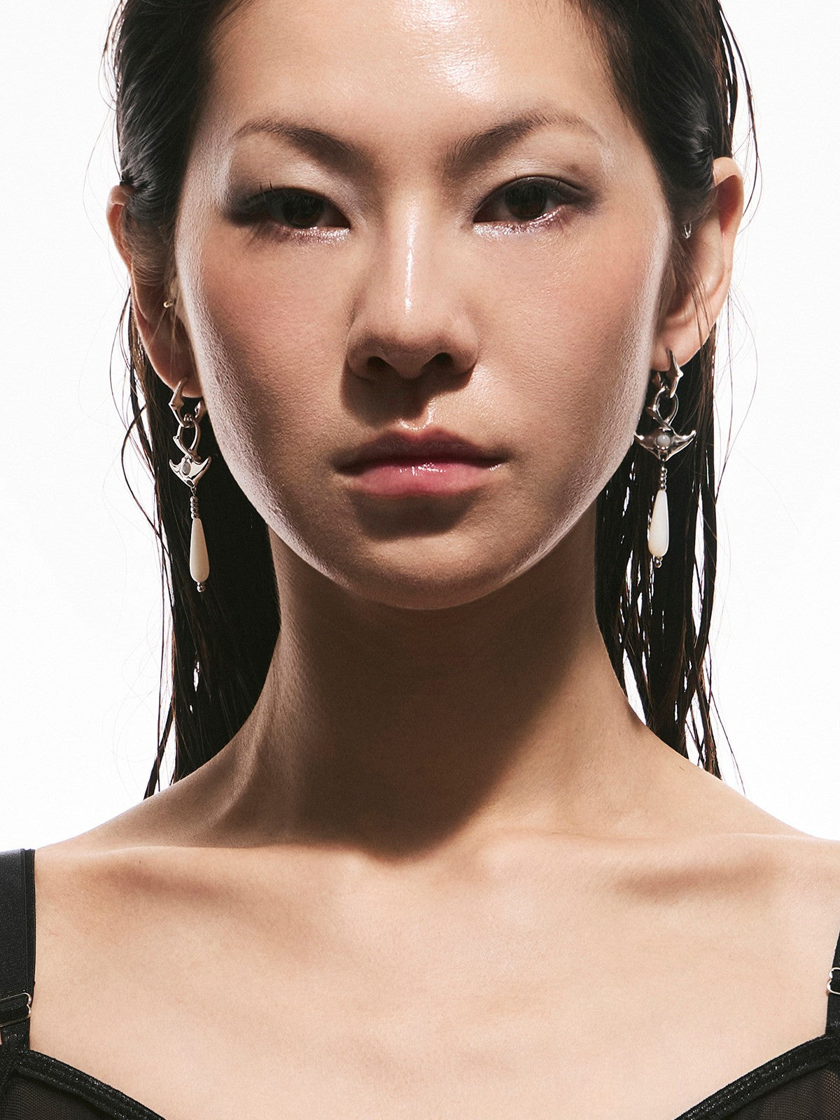 BLACKHEAD Manta Ray Mother of Pearl Drop Earrings in Silver - On Female Model
