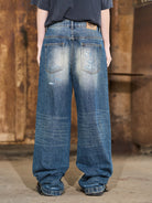 BLINDNOPLAN Distressed Dark Wash Straight Jeans in Blue - On Model