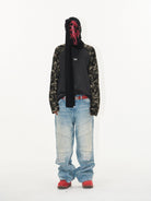 BLINDNOPLAN Paneled Embroidered Distressed Denim Pants in Blue - On Model