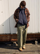 USAGE Heavyweight Herringbone Baker Pants in Olive - On Male Model