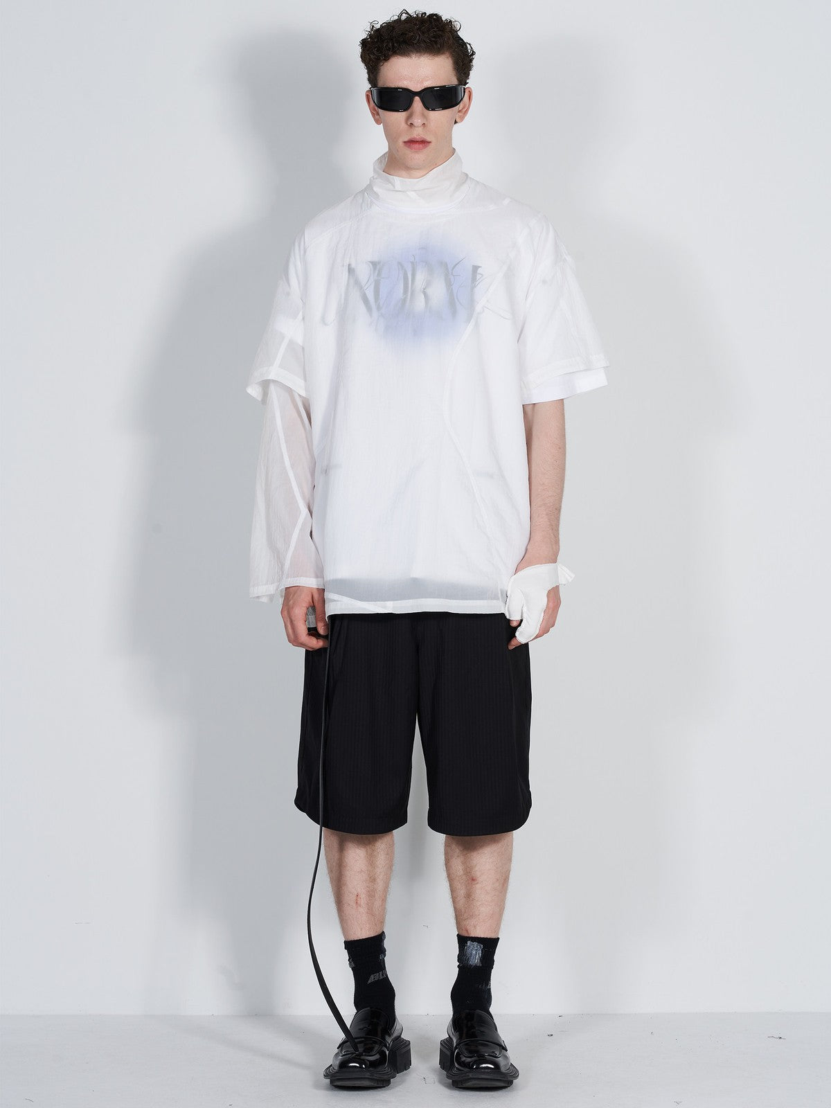 BLINDNOPLAN Asymmetric Striped Suit Shorts in Black - On Male Model