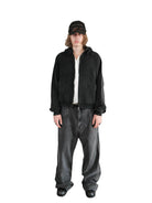 UNKNOWNWORLD Distressed Washed Zip Up Hoodie in Black - On Male Model