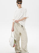 MASONPRINCE Exposed Seam Tape Print T Shirt in White - On Female Model