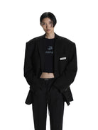 MASONPRINCE Minimalist Textured Two Button Blazer in Gray - On Female Model