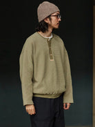 USAGE Heavyweight Waffle Knit Henley Sweatshirt in Olive - On Male Model