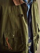 USAGE Corduroy Collar Cotton Fishing Jacket in Olive - On Male Model