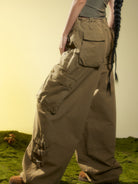 BEERBRO Washed Buckle Strap Cargo Pants in Olive - On Female Model
