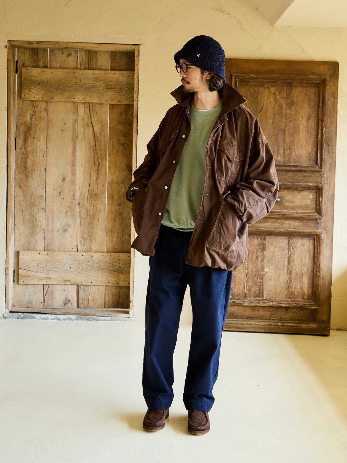 USAGE Washed Cotton Twill M65 Jacket in Brown - On Male Model