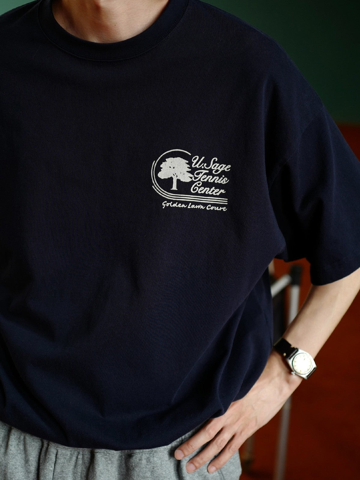 USAGE Retro Tennis Graphic Cotton T Shirt in Navy Blue - On Male Model