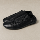 Mingstreet ASC launch still-life | JCAESAR STUDIO | Ruched Asymmetrical Leather Sneakers | Black | generated_missing_still_life_expansion