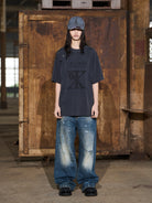 BLINDNOPLAN Distressed Washed Graphic Cotton T Shirt in Gray - On Female Model