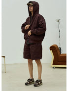 USAGE Crinkle Nylon Hooded Track Jacket in Brown - On Male Model