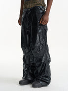 BLINDNOPLAN Faux Leather Layered Cargo Pants in Black - On Model