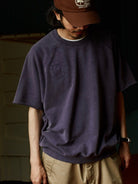 USAGE Vintage Wash Distressed Short Sleeve Sweatshirt in Purple - On Male Model