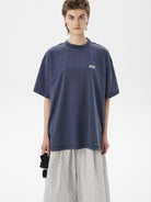 MASONPRINCE Exposed Seam Tape Print T Shirt in Navy Blue - On Female Model