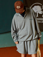USAGE Oversized Textured Long Sleeve Polo in Gray - On Male Model