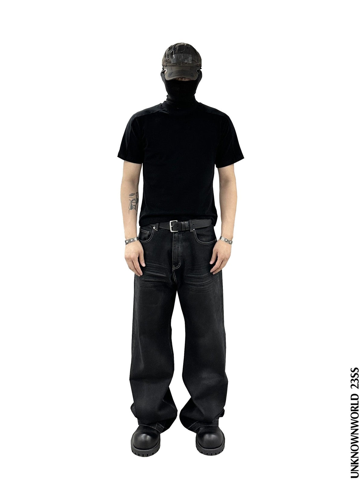 UNKNOWNWORLD Washed Waxed Wide Leg Jeans in Black - On Model
