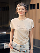 BEERBRO Embroidered Tencel Cinched Tee in Cream - On Female Model