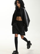 MASONPRINCE Striped Cotton Blend Track Shorts in Black - On Female Model