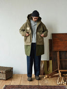 USAGE Hand Distressed Patched Chinos in Navy Blue - On Male Model