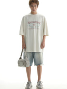 MASONPRINCE Light Wash Raw Hem Denim Shorts in Blue - On Male Model