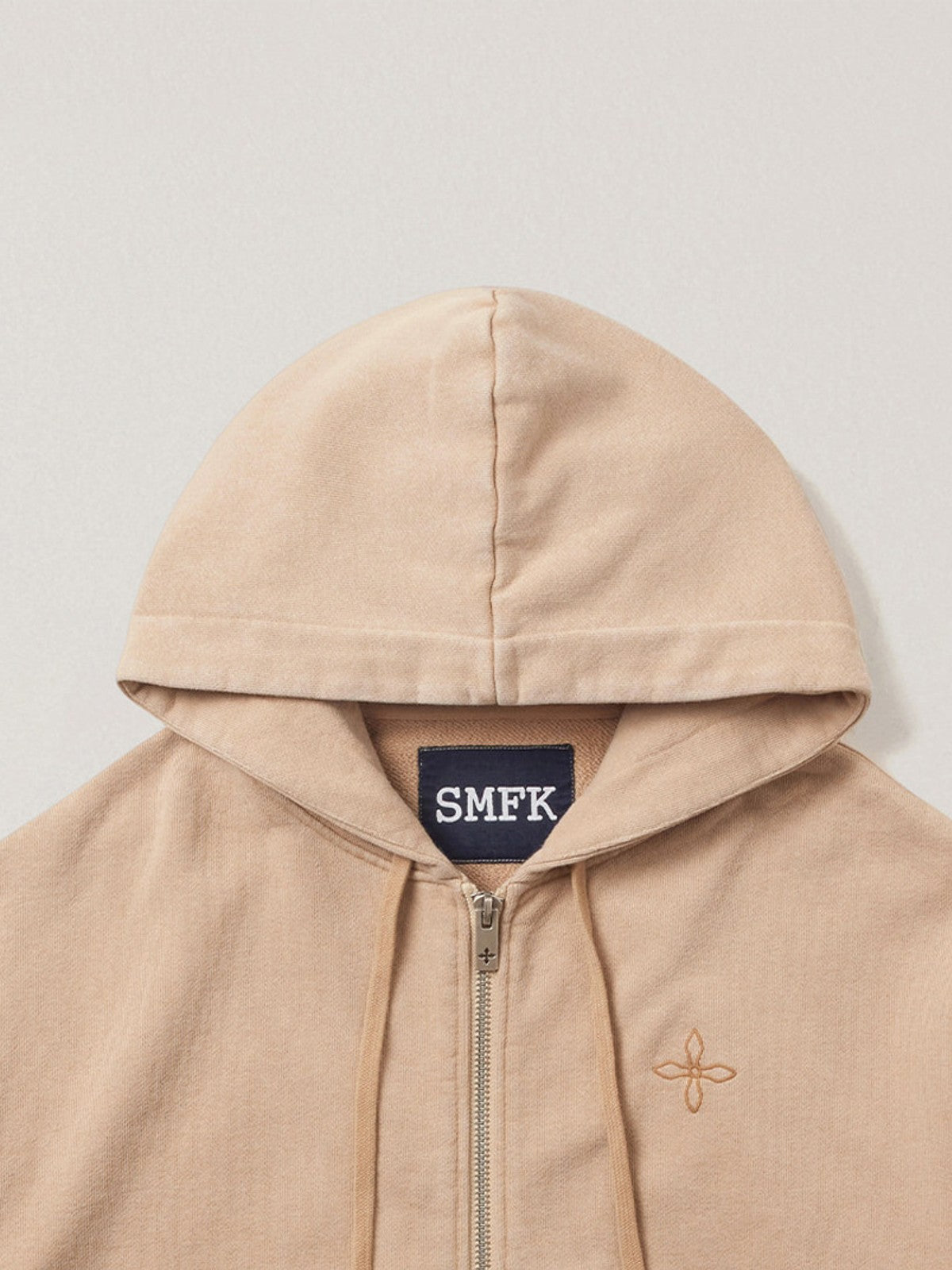 SMFK Cross Embroidered Cotton Zip Up Hoodie in Beige - Detail