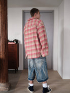 UNKNOWNWORLD Distressed Wash Baggy Shorts in Blue - On Male Model