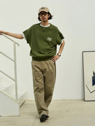 USAGE Raw Edge Cotton Short Sleeve Sweatshirt in Olive - On Male Model
