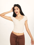 BEERBRO Twist Front Ruched Tee in White - On Female Model