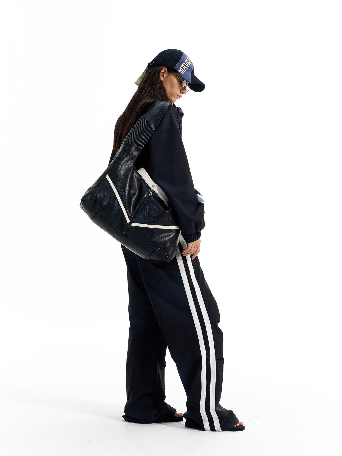 BLINDNOPLAN Striped Pleated Track Pants in Black - On Female Model