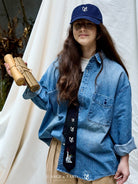 USAGE Washed Distressed Denim Shirt in Denim - On Female Model