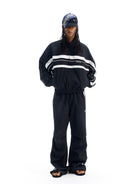 BLINDNOPLAN Color Blocked Zip Up Track Jacket in Black - On Male Model