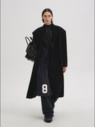 MASONPRINCE Convertible Layered Cotton Skirt Shorts in Black - On Male Model