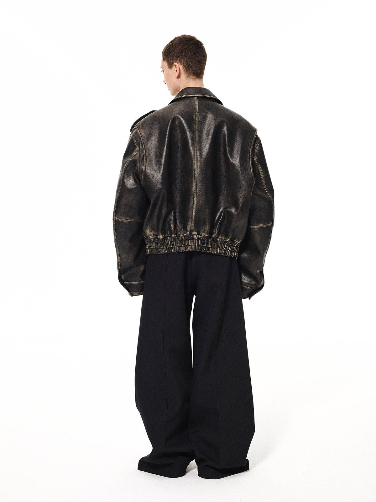 UNKNOWNWORLD Distressed Padded Eco Leather Jacket in Black - On Model
