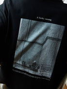USAGE Air Spun Cotton Graphic T Shirt in Black - On Model
