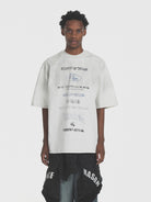 MASONPRINCE Distressed Typographic Cotton T Shirt in Gray - On Male Model