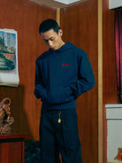 SOD Embroidered Padded Shoulder Hoodie in Blue - On Male Model