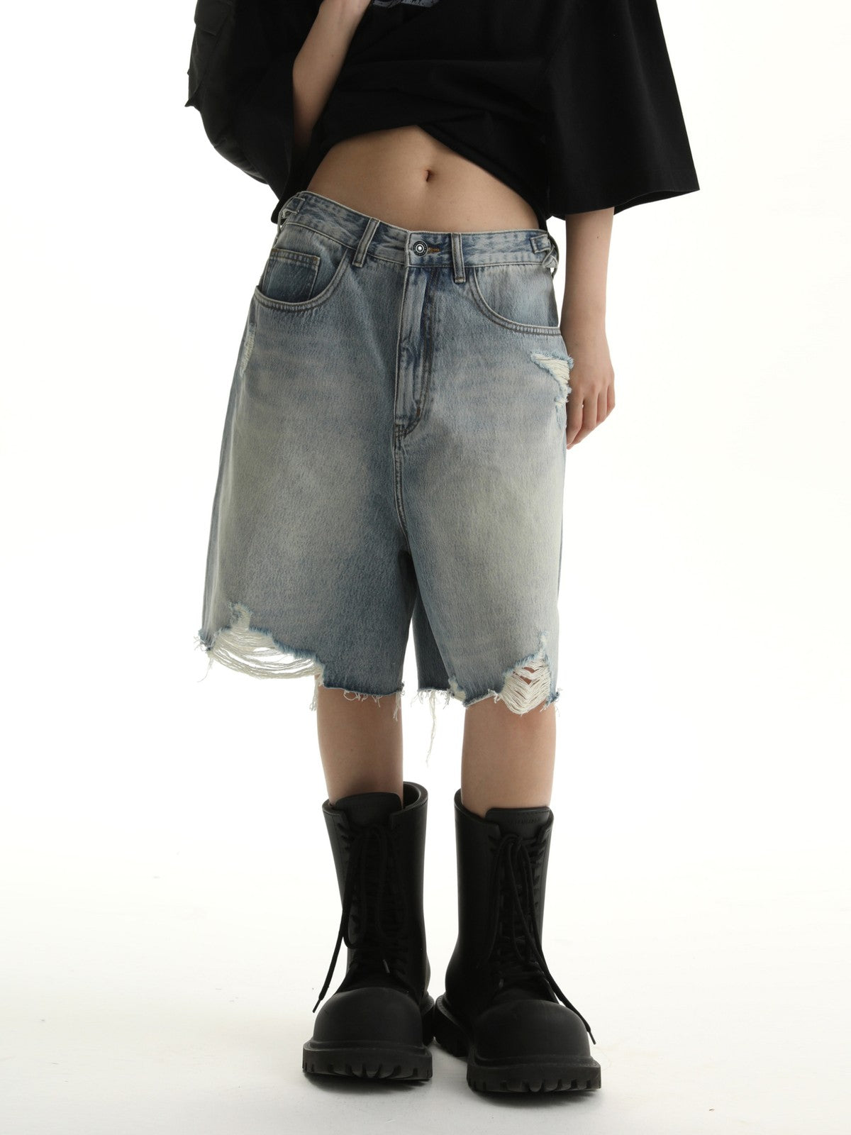 MASONPRINCE Light Wash Raw Hem Denim Shorts in Blue - On Female Model